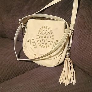 Beautiful design cream purse.